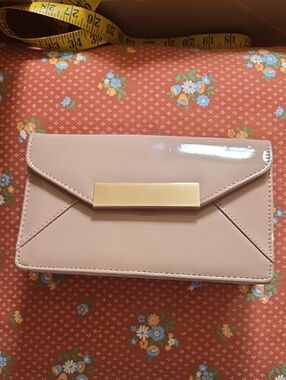 Aldo Blush Patent Envelope Clutch with Gold Bar